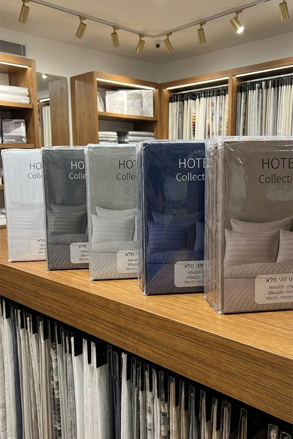 מצעי פסים אירוח - לבן